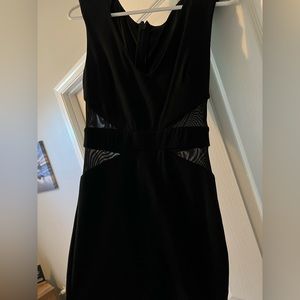 Lined little black dress with cut out detail